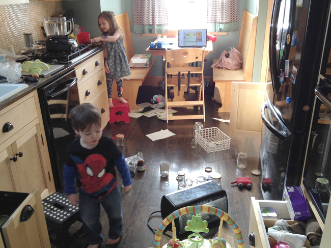 Kids in the kitchen while making a five-piece chicken dinner.